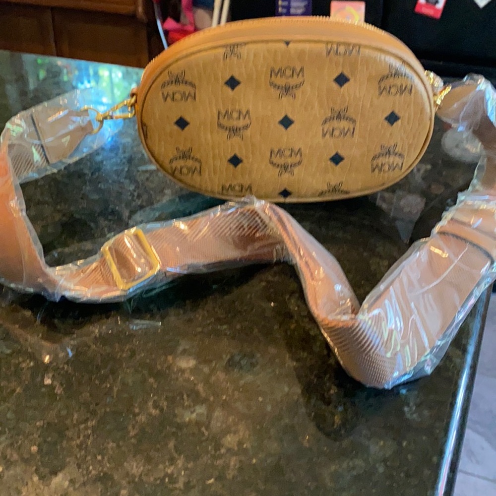 MCM purse new purchased. At mom store. Have paperwork